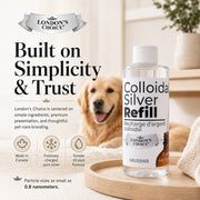 London's Choice colloidal silver refill bottle for pets on a wooden tray with a blurred golden retriever in background